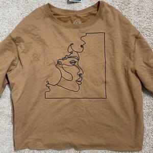 brown long sleeve with canvas on it